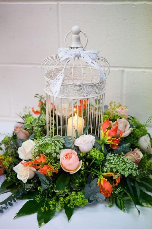 bird cage with flowers for hire