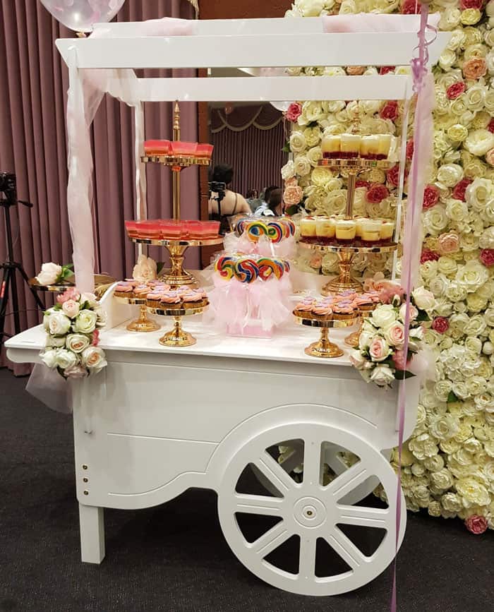 Candy cart with cakes and candy