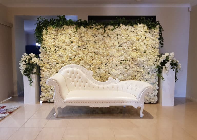 Mehndi (Henna) Ceremony - flower wall and French Chaise